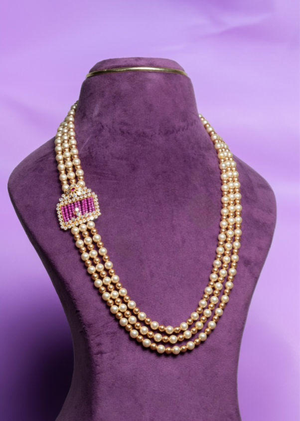 Three-Layer Asymmetrical Pink Sapphier Side Brooch and South Sea Pearls With Gold Pearls