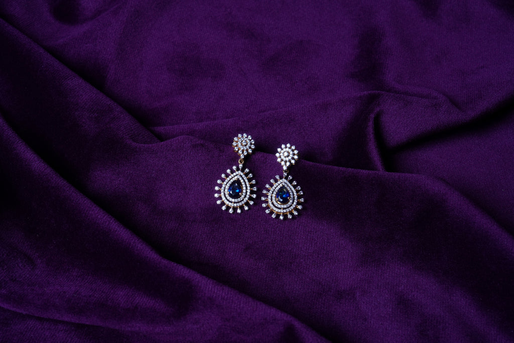 Emerald Teardrop Halo Dangler Earrings