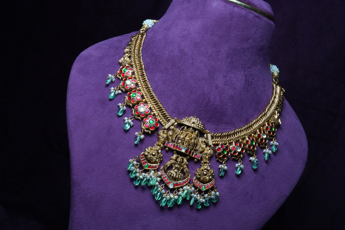 Ananya Emerald-Toned ram Parivar Kundan Necklace