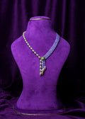 Side-Mugappu Multi-Strand Freshwater Pearls and Tanzanite Zircon Beads with Emerald Locket