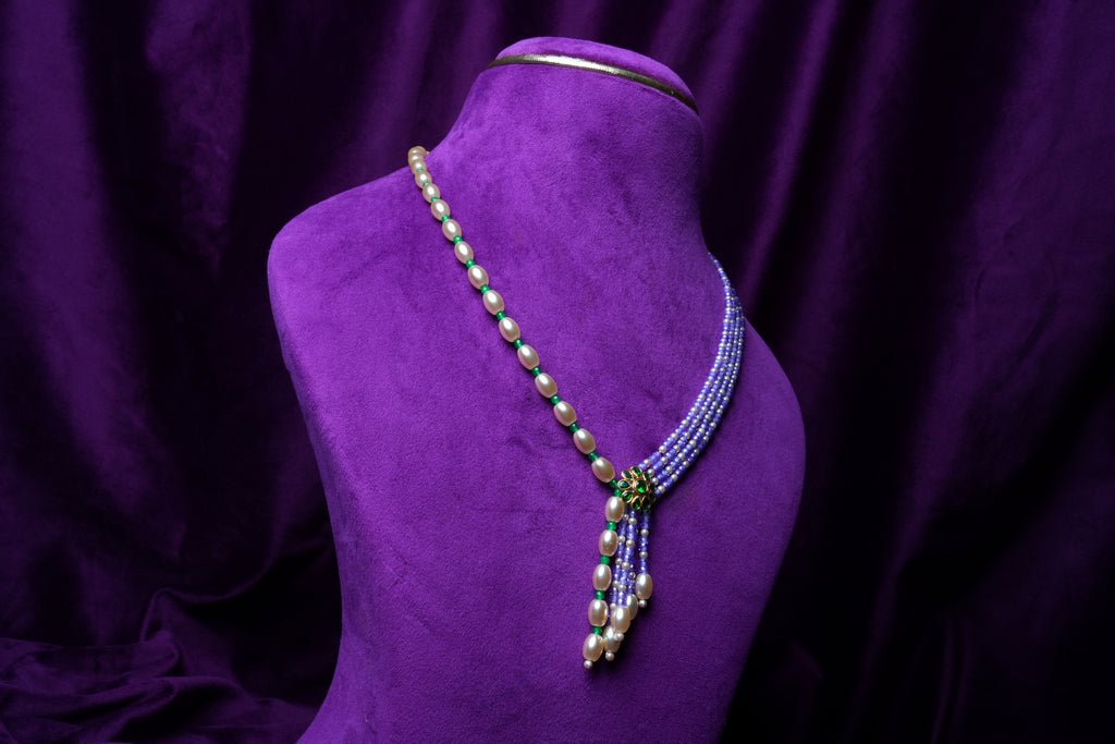Side-Mugappu Multi-Strand Freshwater Pearls and Tanzanite Zircon Beads with Emerald Locket
