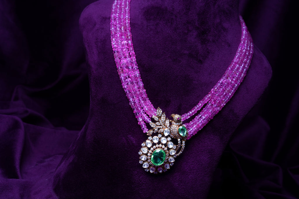 Four-Layer Pink Tourmalines and Polki Mayil Chakri Motif Pear-Shape with Emerald Drop Pendant
