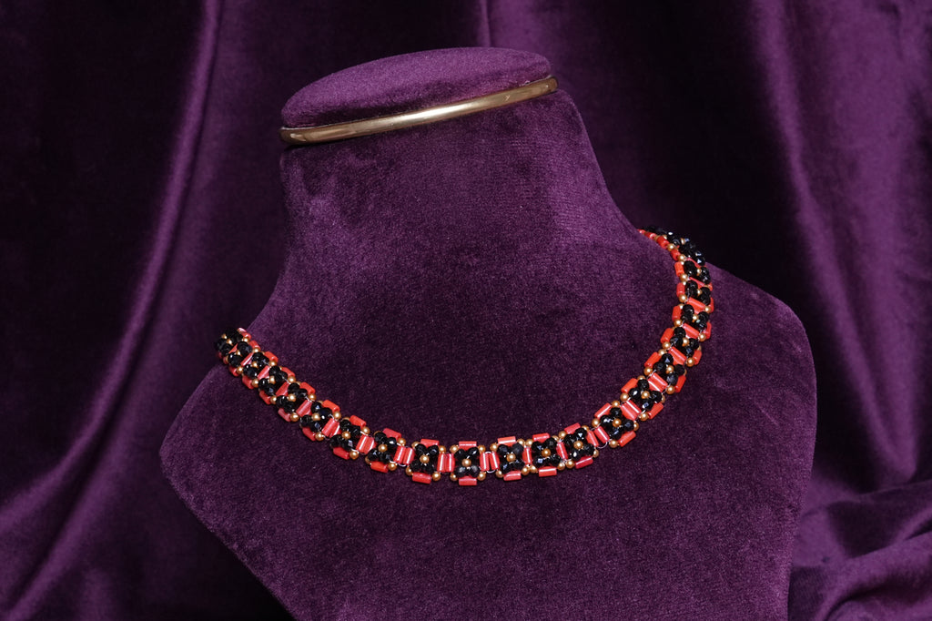 Beaded Rosetta 3D Segmented Coral and Black Geometric Ladder Choker