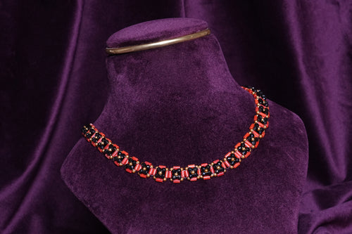 Beaded Rosetta 3D Segmented Coral and Black Geometric Ladder Choker
