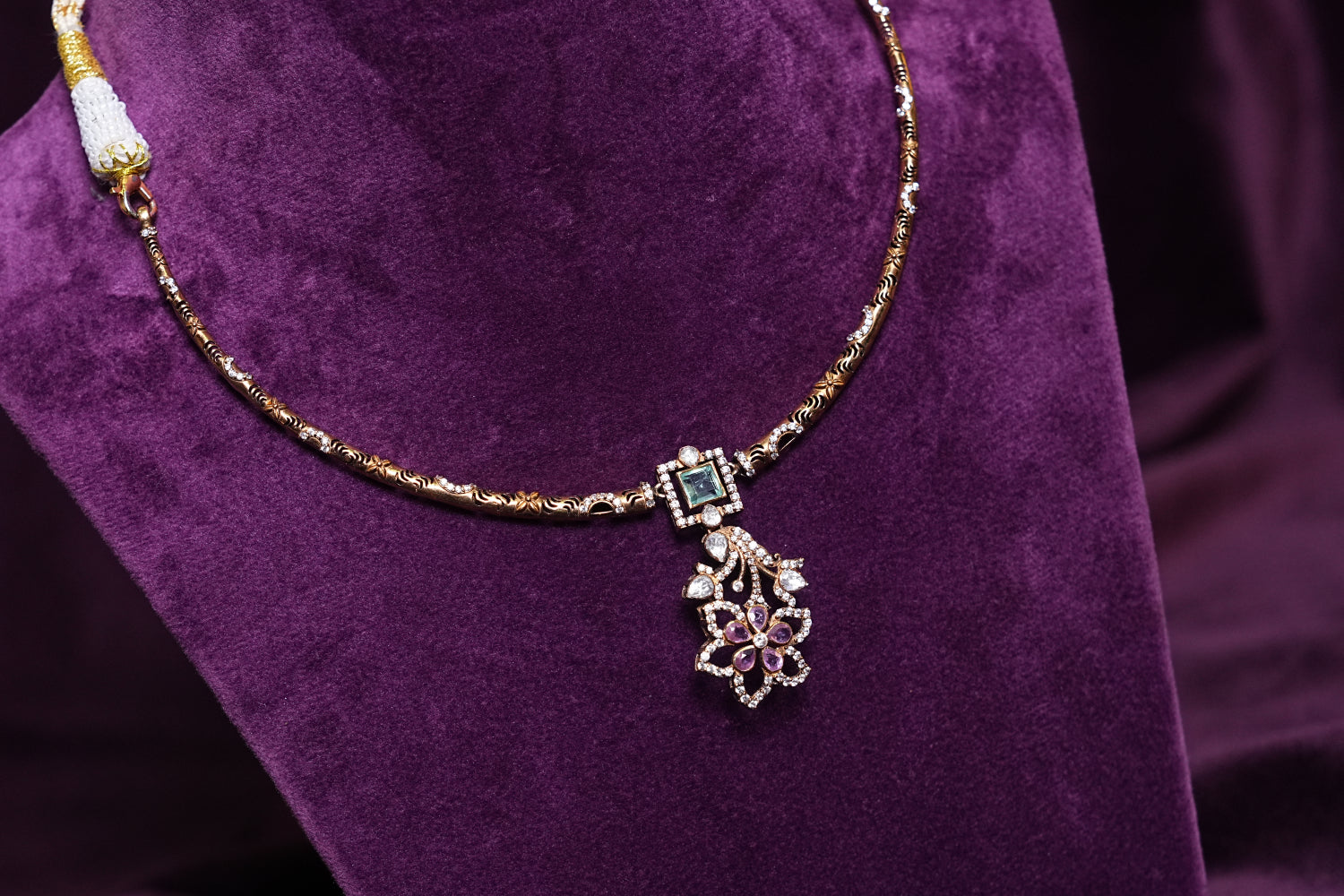 Emerald & Tourmaline Carved Textured Hasli With a Geometric Floral Poliki Pendant