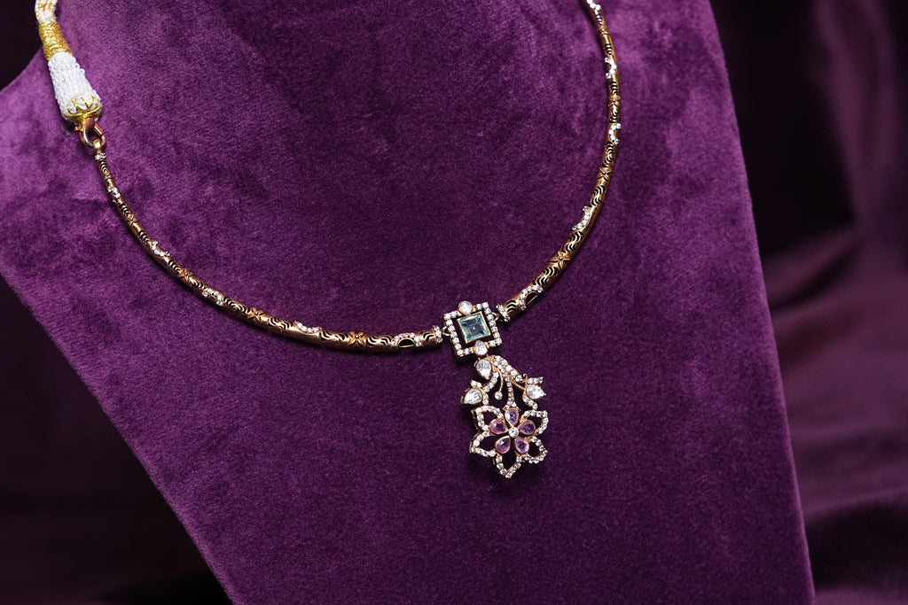Emerald & Tourmaline Carved Textured Hasli With a Geometric Floral Polki Pendant