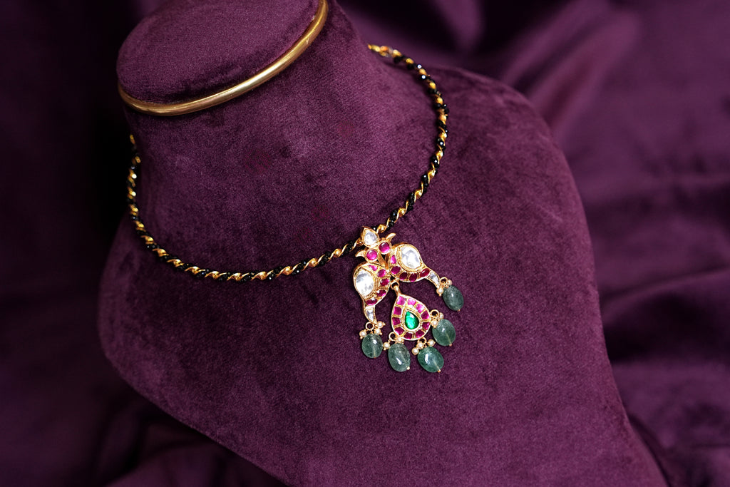 Black Kante Hasli With a Mayil Kundan and Emerald Pendant