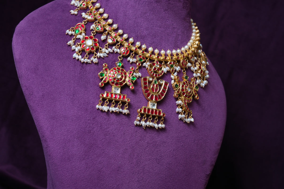 The Tirupati Shankh Chakra Kemp Choker