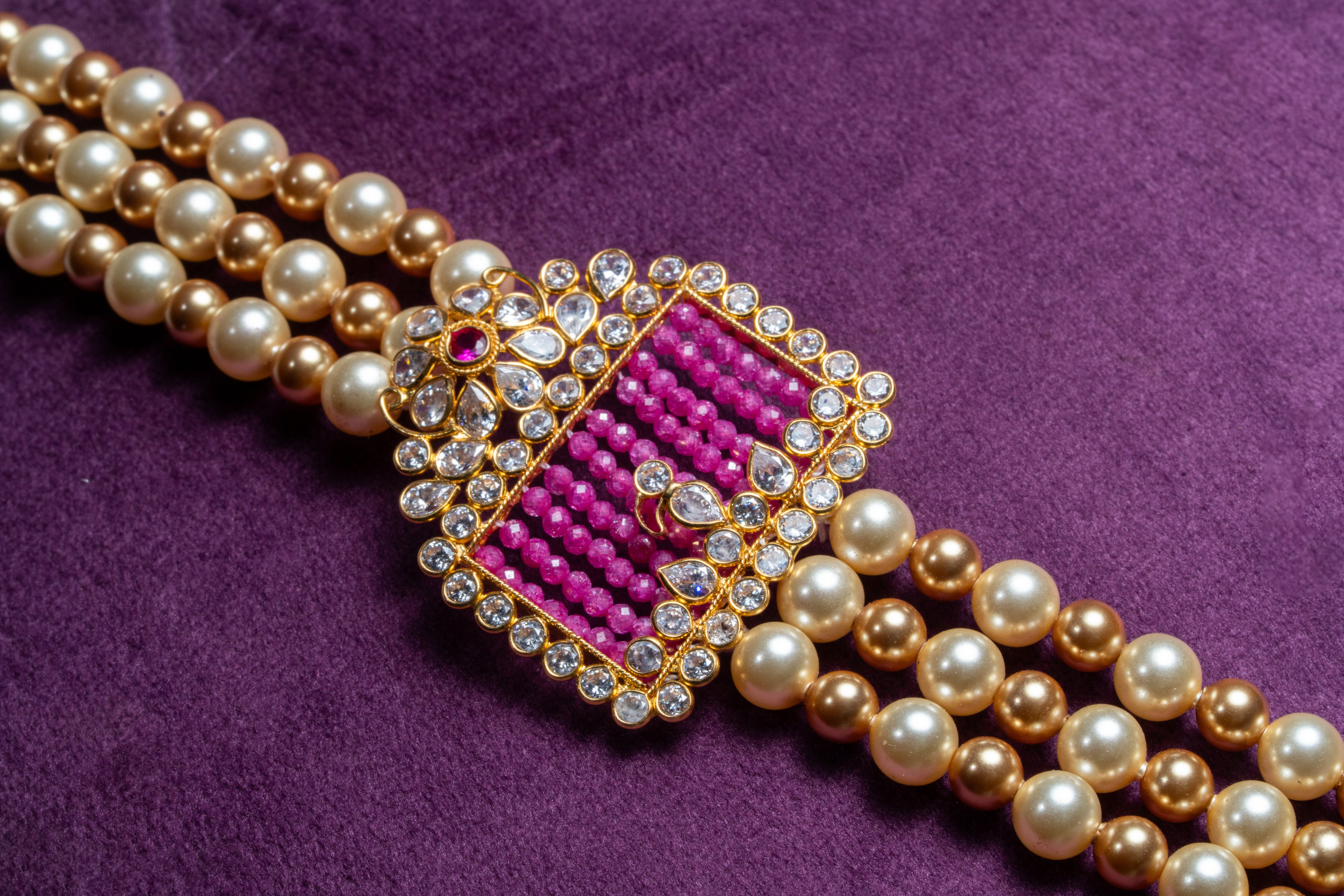 Three-Layer Asymmetrical Pink Sapphier Side Brooch and South Sea Pearls With Gold Pearls