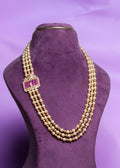 Three-Layer Asymmetrical Pink Sapphier Side Brooch and South Sea Pearls With Gold Pearls