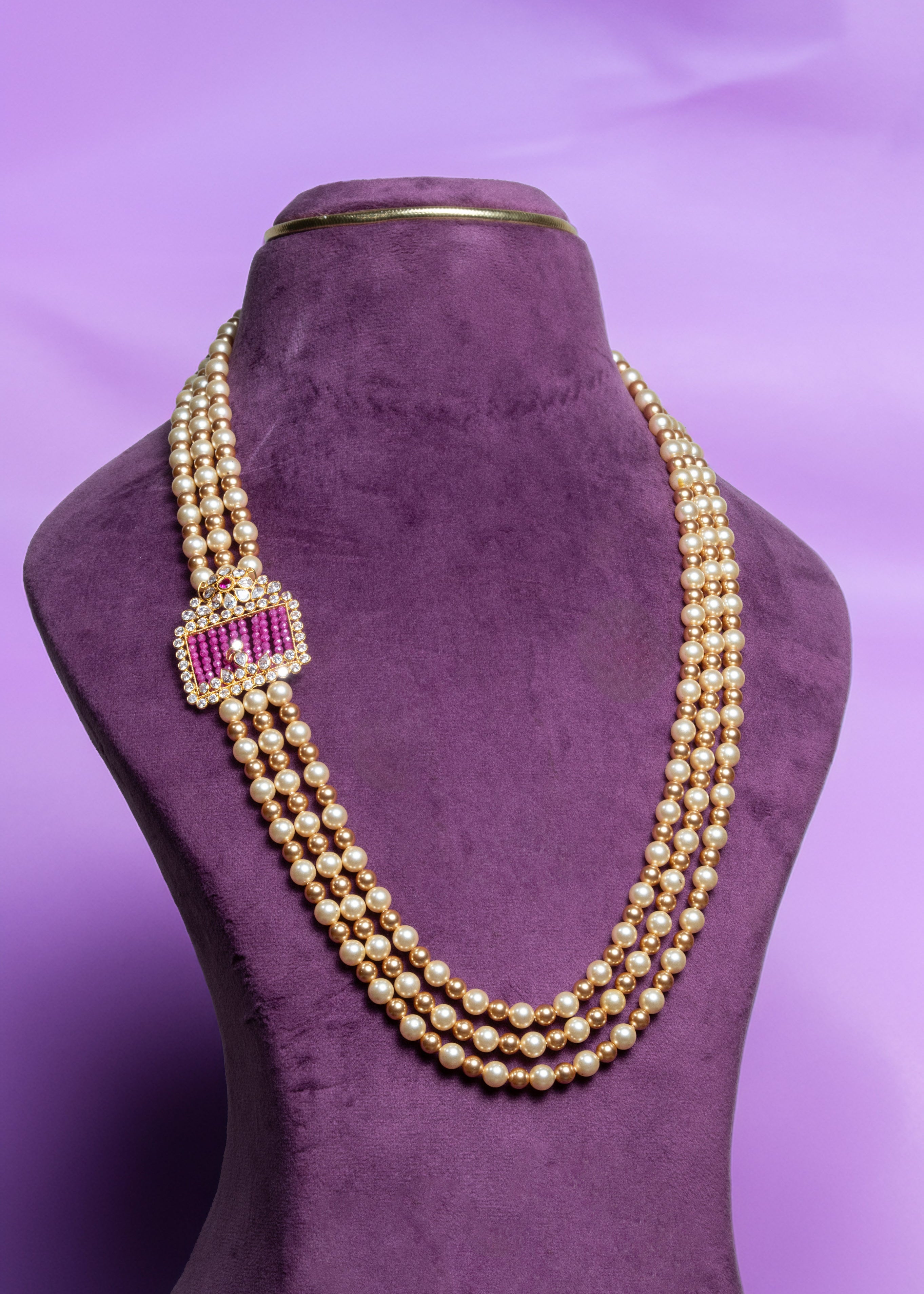 Three-Layer Asymmetrical Pink Sapphier Side Brooch and South Sea Pearls With Gold Pearls